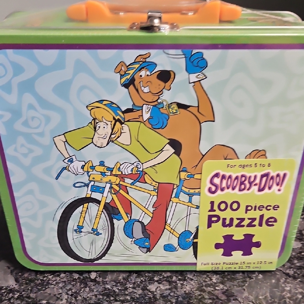 100 Piece Puzzle in Green Tin